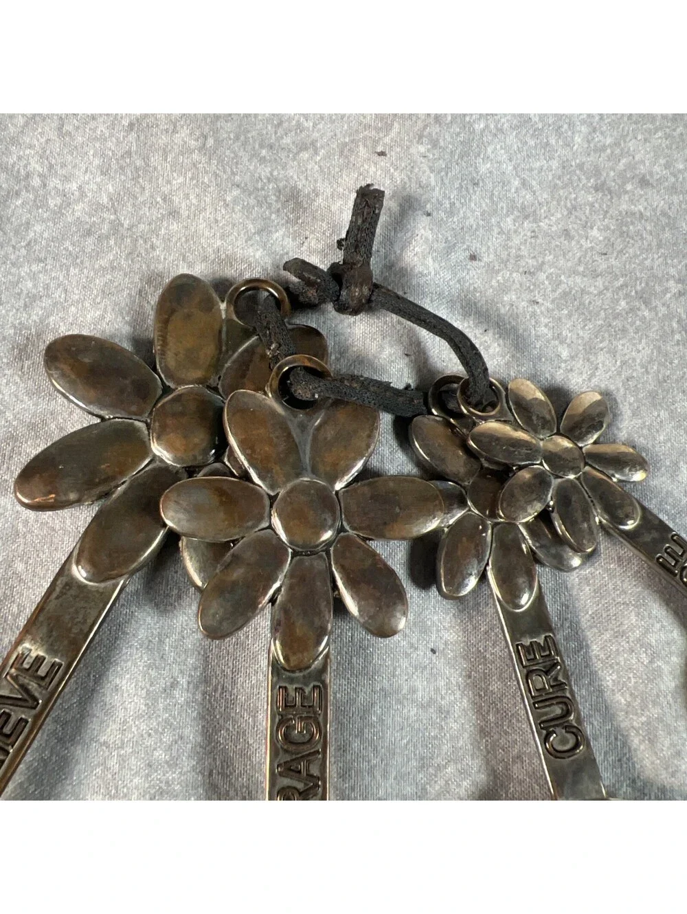 Metal Measuring Spoons With Flower Handle & Cancer Awareness Message